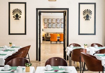 Salle de petit déjeuner - Hôtel Napoléon