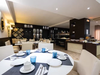 Hôtel Revellata salle petit-déjeuner - Hôtel Revellata