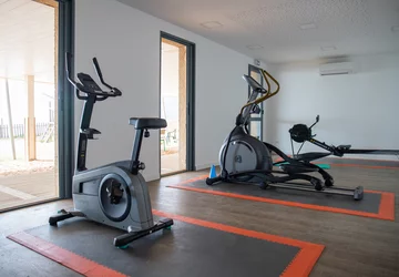 Hôtel-club résidence Paese di Lava salle de fitness - Village de Vacances Paese di Lava en Résidence